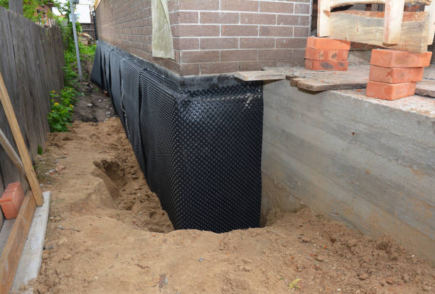 Happy homeowners after waterproofing job in Overpeck